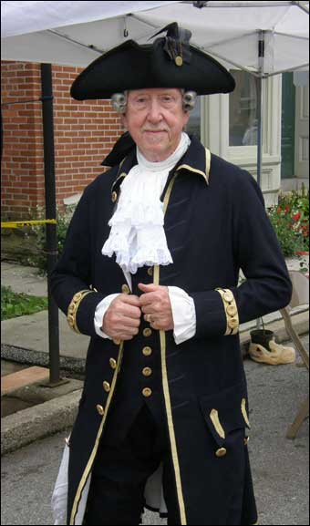 Reenactor in colonial military attire